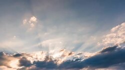 Timelapse clouds with sun rays (real rays on a hazy day) Stock Footage