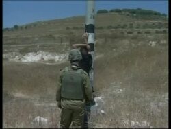 Israeli army arrests teenager over alleged weapon smuggling News Clip