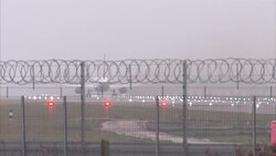Planes taking off at Heathrow Airport during in foggy weather News Clip
