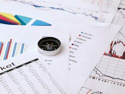 Compass and stock market chart Stock Footage