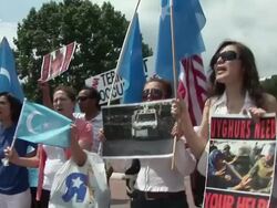 2009 MS PAN Row of protestors with flags and posters shouting slogans during an anti-China protest in support of the Uygurs/ Washington D.C., USA/ AUDIO Stock Footage