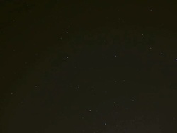 Time lapse of stars moving through night sky Stock Footage