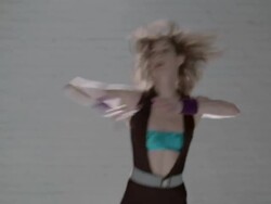 Woman dancing and striking a pose Stock Footage