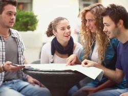 Group of friends consulting a map at bar Stock Footage