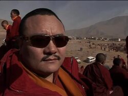 WRAP Mass cremation for quake victim; aid handed out, bodies recovered News Clip