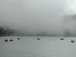 Block shot foggy bhimtal lake nainital uttarakhand india Stock Footage