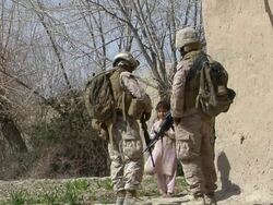 WS Soldiers talking with children / Mausa Qala, Helmand Province, Afghanistan. Stock Footage