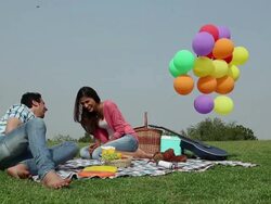 Young couple enjoying in the park, Delhi, India Stock Footage