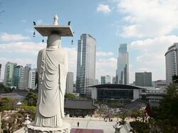 MS Shot of Landscape and Cityscape around Bongeuns with statue of buddhist ( Buddhist temple located in Seoul) / Seoul, South Korea Stock Footage