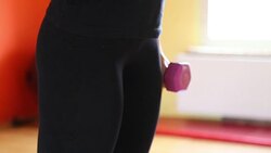 Young woman exercising in gym Stock Footage