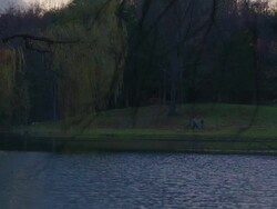 camera pan to two dancers dancing in distance Stock Footage