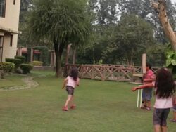 Group of kids playing cricket in holi festival  Stock Footage