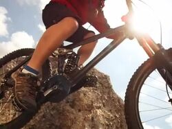 HD Super Slow-Mo: MTB Jumping On Extreme Mountain Trail Stock Footage