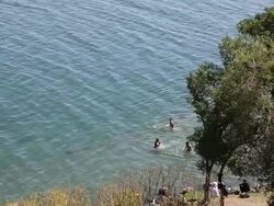 Sevan lake, people swimming in the lake Stock Footage