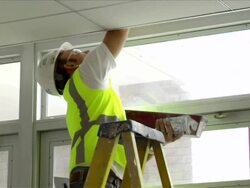 Construction Worker Applies Spackle to Ceiling Stock Footage