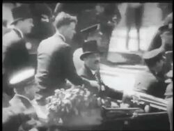B/W 1927 high angle REAR VIEW Charles Lindbergh sitting in car in ticker tape parade / NYC Stock Footage