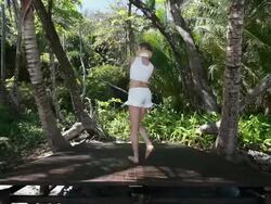 MS Ballerina dancer dancing in point shoes on wooden stage surrounded by palm trees / Montezuma, Nicoya Peninsula, Costa Rica Stock Footage