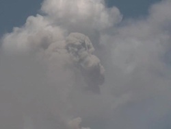 Volcanic ash shoots high into atmosphere from large eruption, Mayon volcano, Philippines, December 2009 Stock Footage
