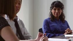 MS TU Group of three coworkers in discussion in conference room Stock Footage