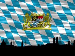 Munich skyline silhouette with bavarian flag Stock Footage