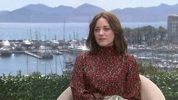 INTERVIEW - Marion Cotillard on how the character of Gabrielle fascinated her and her characters key traits at 'Mal de Pierres' - Interview Stock Footage