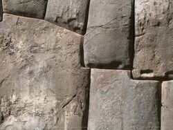 MS Massive stone wall and gate of Inca fortress at Sacsayhuaman / Cuzco, Peru Stock Footage