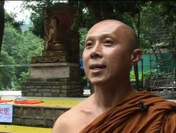 Dogs converted to Buddhist faith News Clip