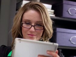 Woman in office looking at tablet Stock Footage
