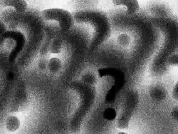QUESTION MARK : dust, white back - (TRANSITION) Stock Footage