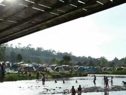 Time lapse of People walk on a rope bridge Stock Footage