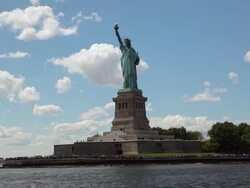View of the Statue of Liberty while floating the Hudson River by ferry. Stock Footage