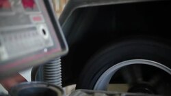 Flat Tire Repair and Car Maintenance at Garage Stock Footage