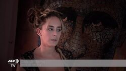 VOICED : El retrato de Putin hecho con balas News Clip