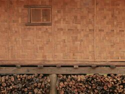 MS Wall of house made by bamboo slats woven /  Vang Vieng, Vientiane, Laos Stock Footage