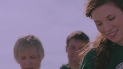 Volunteers moving through check in line Stock Footage