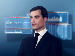 Businessman surrounded by spinning financial graphs Stock Footage