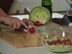 CU  off female chopping vegetables in kitchen Stock Footage