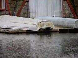HD boats on dock by river Stock Footage