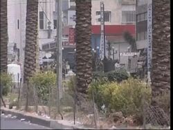 Clashes betwn Shiites/Sunnis; pro-govt supporters block road News Clip