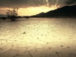 MS POV View of Dry Cracked Earth at sunset / Death Valley, California, United States Stock Footage