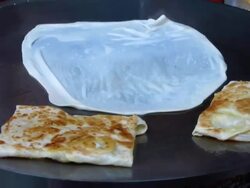 Roti cooking Stock Footage