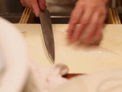 CU Shot of chef preparing fish and Japanese food in restaurant / Tokyo, Kanto, Japan Stock Footage