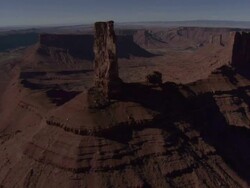 High Angle aerial - Red buttes rise from the valley floor in Monument Valley / Arizona, USA Stock Footage