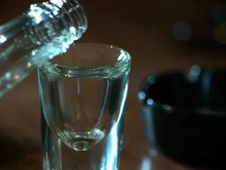 POURING A WHISKEY SHOT-ALCOHOL-DEPRESSION-HD Stock Footage