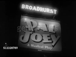 1952: BROADWAY: MANHATTAN, NEW YORK: NIGHT:  VS Broadhurst Theatre marquee, 'Pal Joey, A Musical Play,' various people, attendees, standing outside theater on West 44th Street. NYC, Theatre District, The Great White Way, show, performance Instructional Video