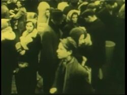 Polish Jews walk along the Ghetto area in Warsaw, Poland. News Clip