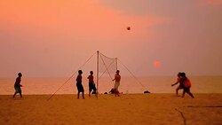 volleyball on sunset beach Stock Footage