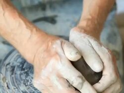 potter preparing clay at potter's wheel Stock Footage