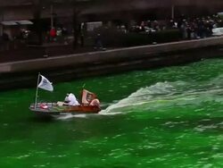 Chicago River Dyed Green In St. Patrick's Day Tradition Stock Footage