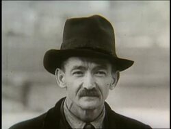 B/W 1900's close up of immigrant man with mustache in hat Stock Footage